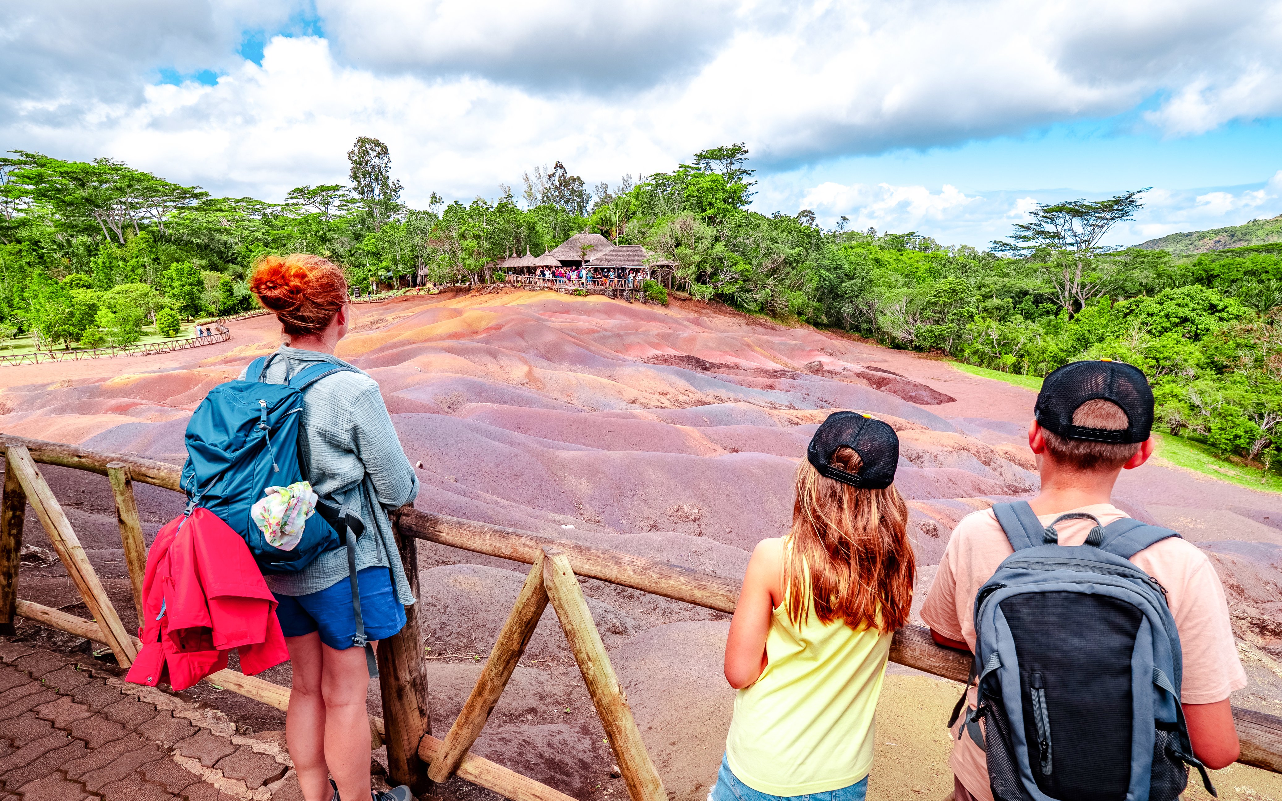 Visitors observing the Chamarel 7 Coloured Earth in Mauritius.