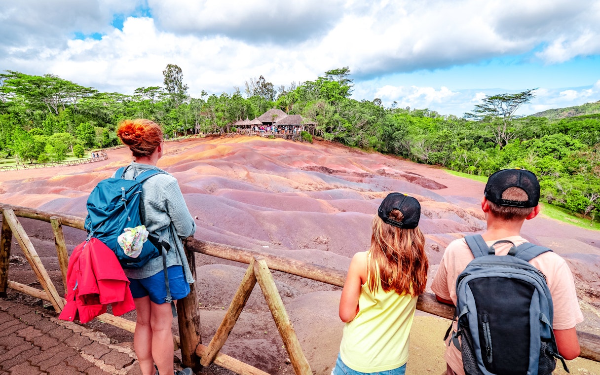 Visitors observing the Chamarel 7 Coloured Earth in Mauritius.
