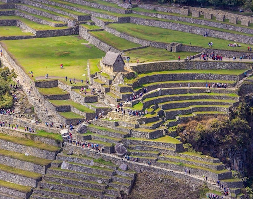 Amazing top view from The Three Doors Group and the Sacred Main Square at Machu Picchu old Inca Empire citadel