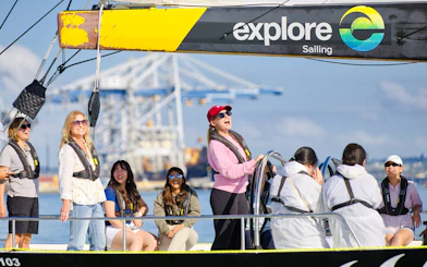Participants enjoying America's Cup Sailing on Auckland's Waitemata Harbour.