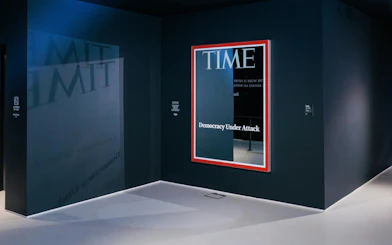 Exhibit featuring Time magazine cover at Moco Museum, London
