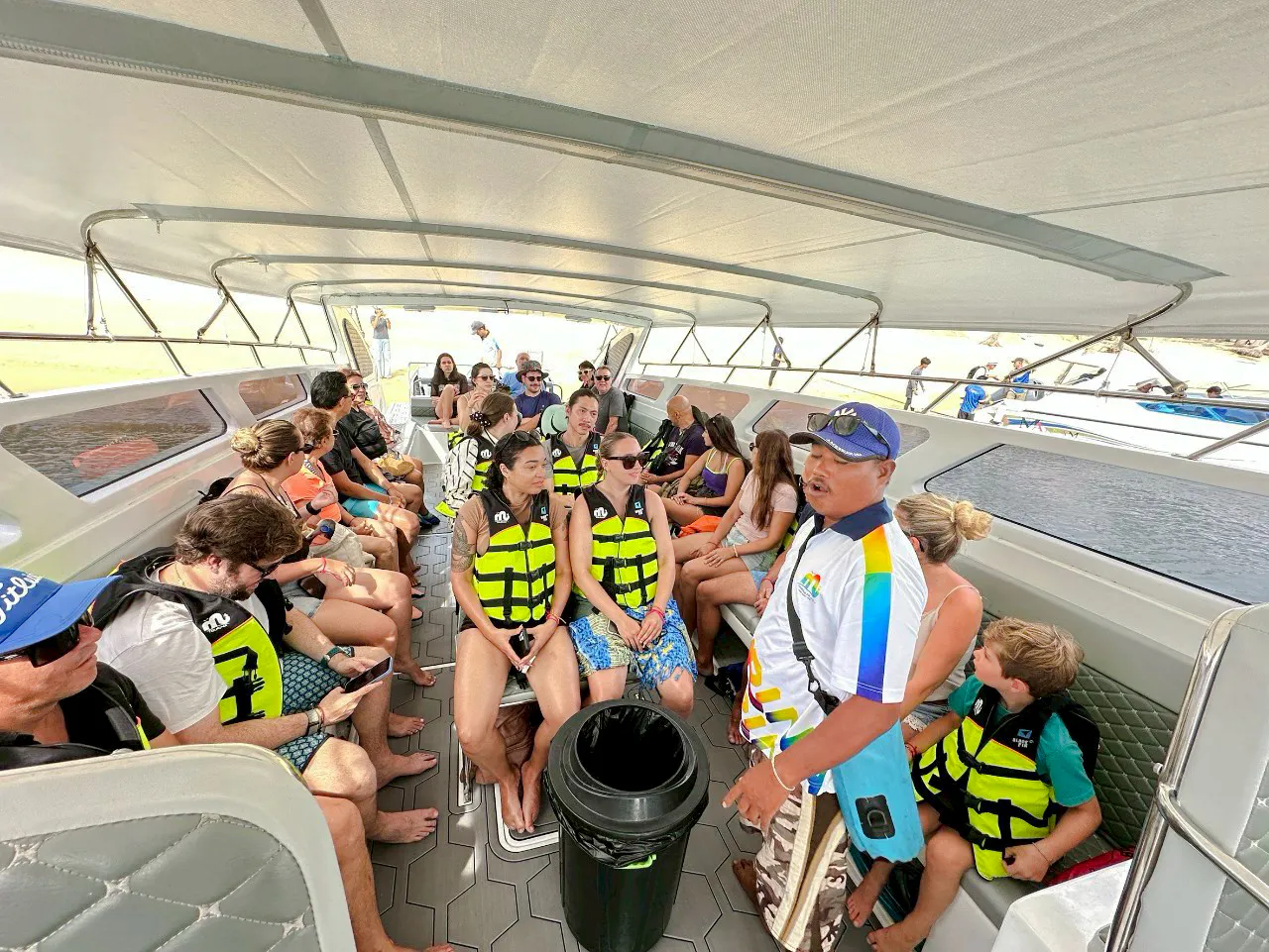 Tourists wearing life jackets on a boat during island hopping at Anthong Marine Park, Koh Samui.