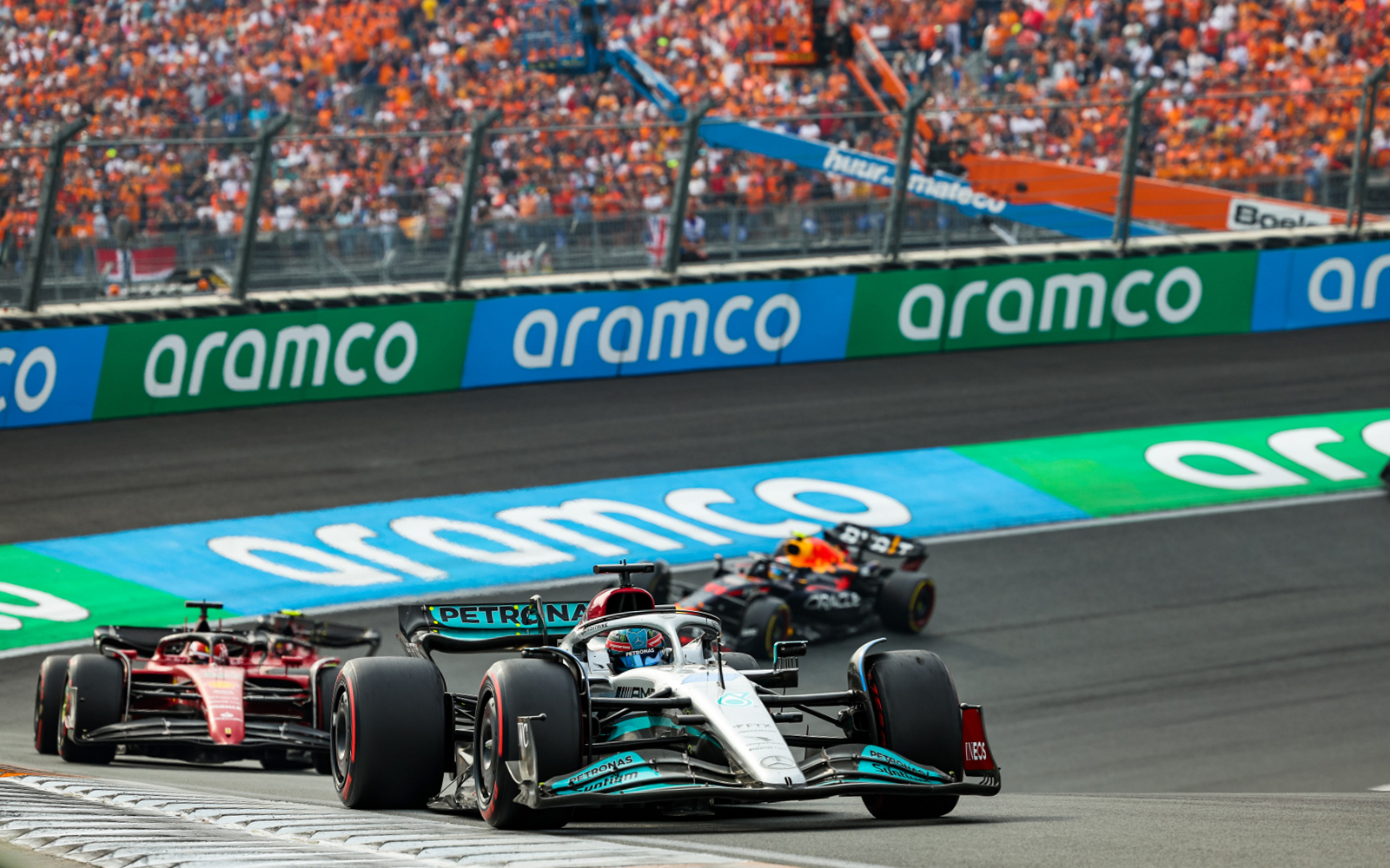 Formula 1 cars racing at Dutch Grand Prix, Zandvoort, August 2023.