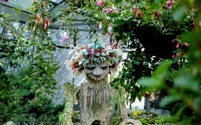 Whimsical floral sculpture at Gardens by the Bay's Floral Fantasy in Singapore.