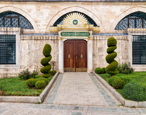 Hagia Sophia side entrances in Istanbul, showcasing historic architecture and intricate stonework.