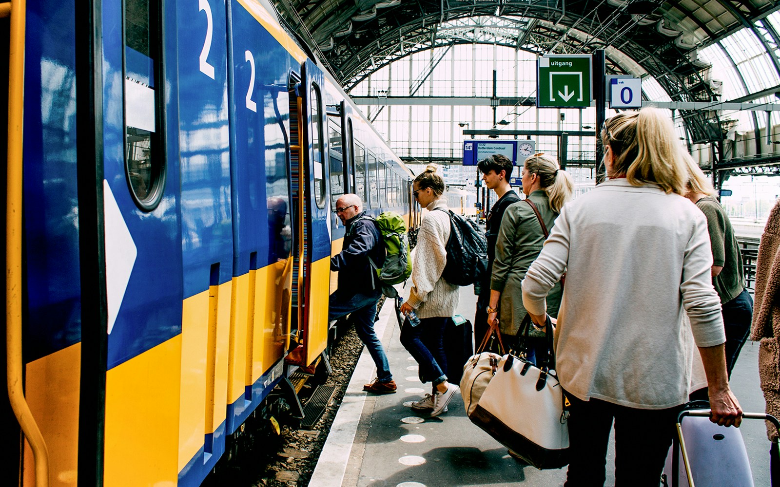 Passengers getting on Swiss Train