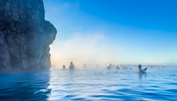 Sky Lagoon geothermal spa with steam rising, Reykjavik, Iceland, winter sunny day.