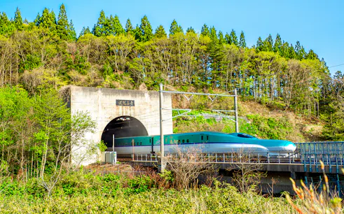 High-speed Hokkaido Shinkansen train entering Seikan Tunnel, Imabetsu, Aomori Prefecture, Japan.