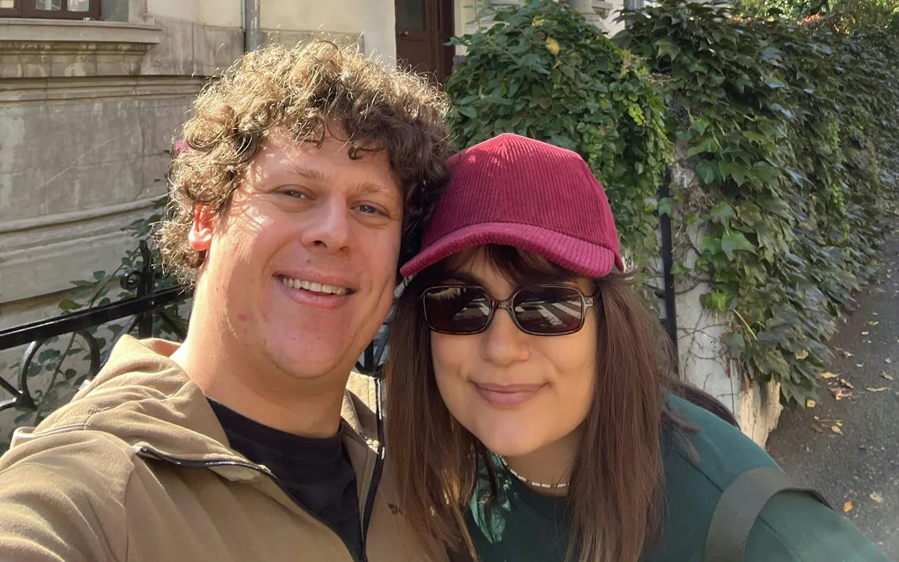 Couple exploring Floreasca neighborhood in Bucharest during a self-guided city game.