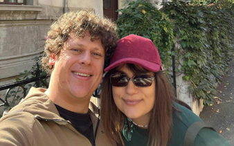 Couple exploring Floreasca neighborhood in Bucharest during a self-guided city game.