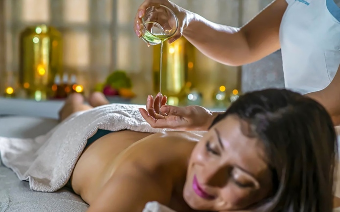 Massage therapy with oil at Pesterzsebet Bath, Budapest.