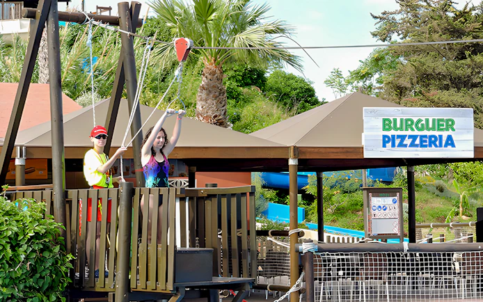 Visitors preparing for zip line at Aquopolis Torrevieja.