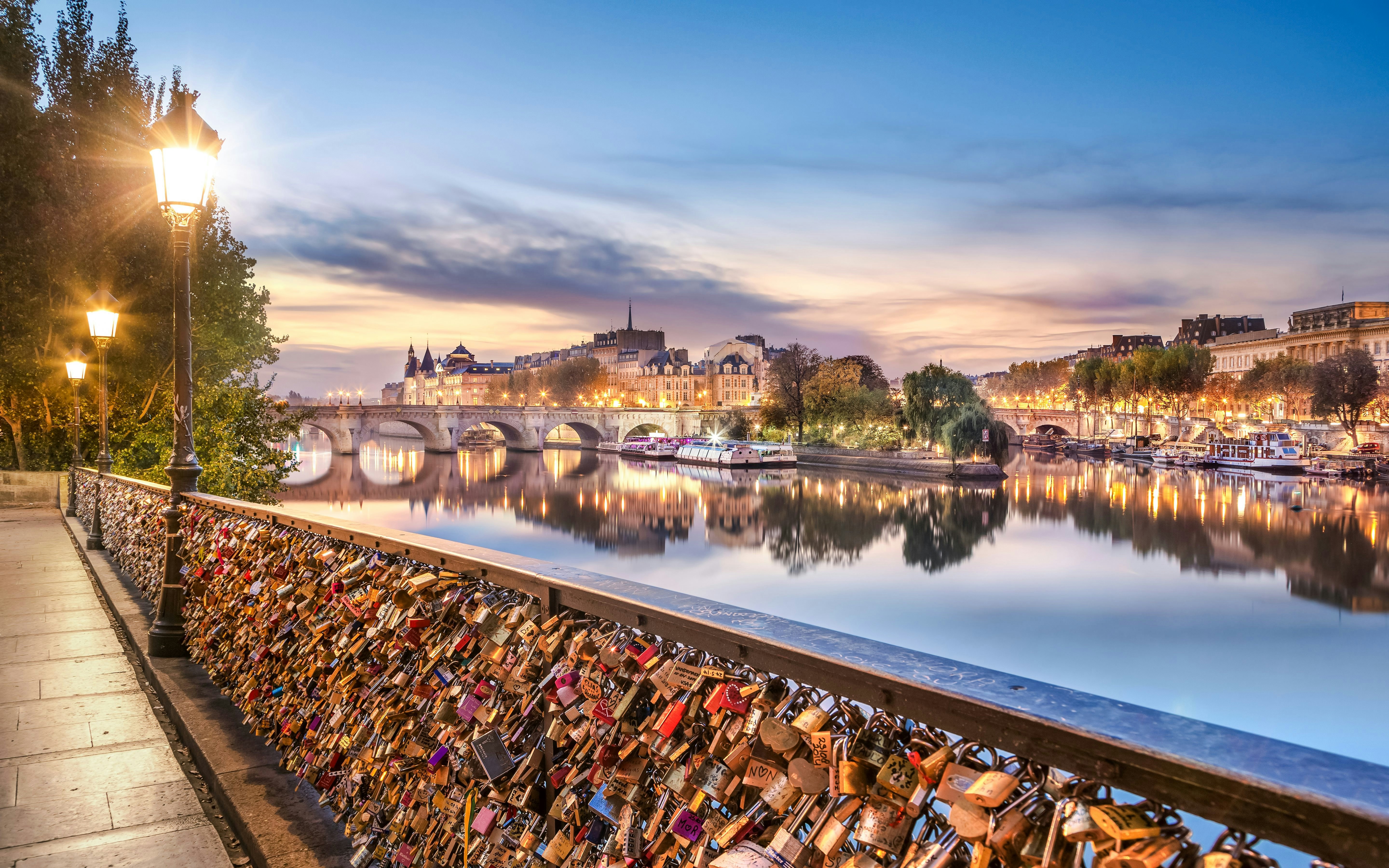 Pont des Arts bridge with love locks at sunset, Paris, France.