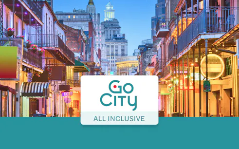 Bourbon Street in New Orleans with vibrant lights and historic architecture.