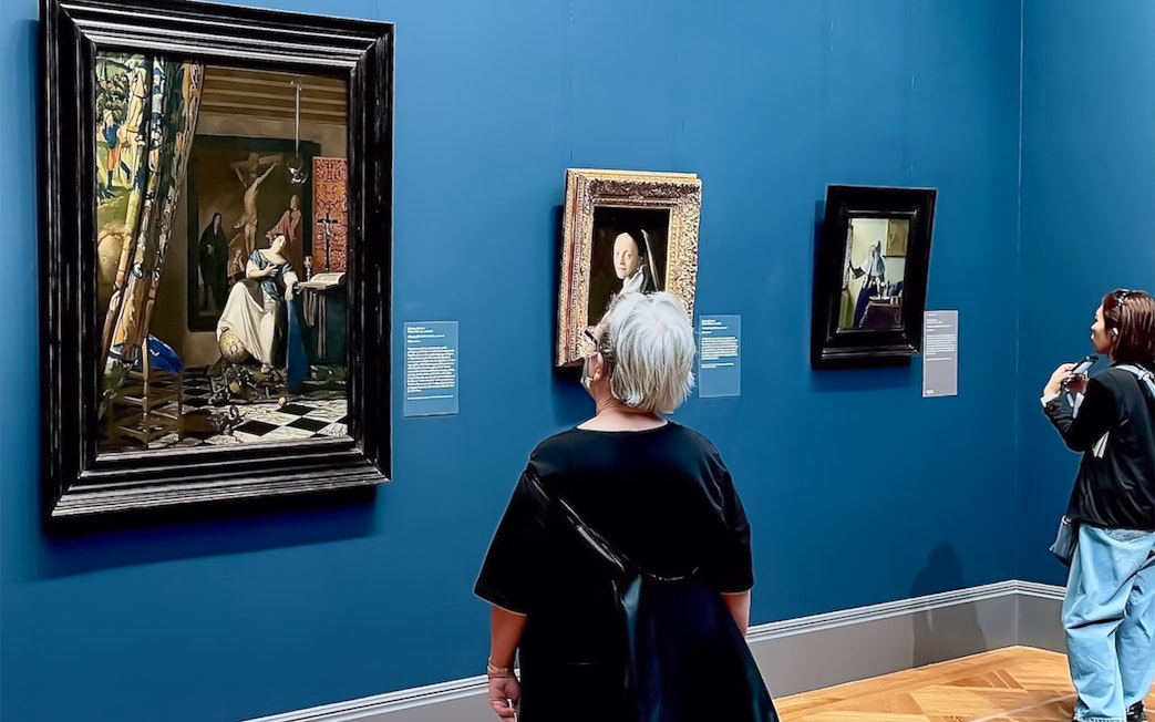 Visitors viewing paintings at The Met Museum during a pre-orientation tour.