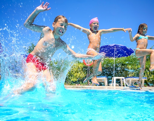Kids jumping in the pool at Ramayana Water Park