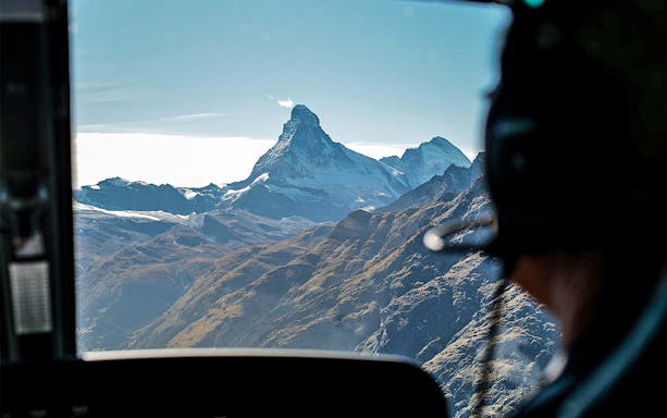 View of the Matterhorn from a helicopter cockpit during a tour.