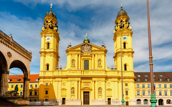 Theatinerkirche facade with twin towers in Munich, Germany.