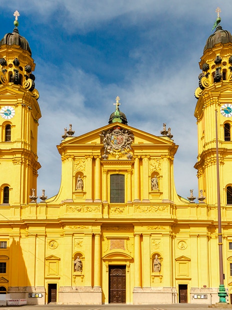 Theatinerkirche facade with twin towers in Munich, Germany.