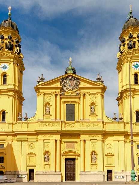 Theatinerkirche facade with twin towers in Munich, Germany.