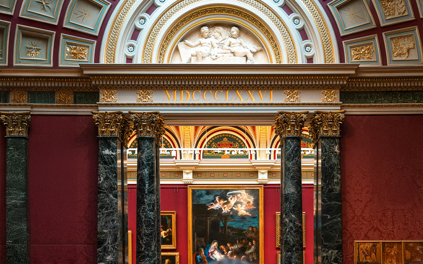 National Gallery London interior with classic European paintings and ornate architecture.