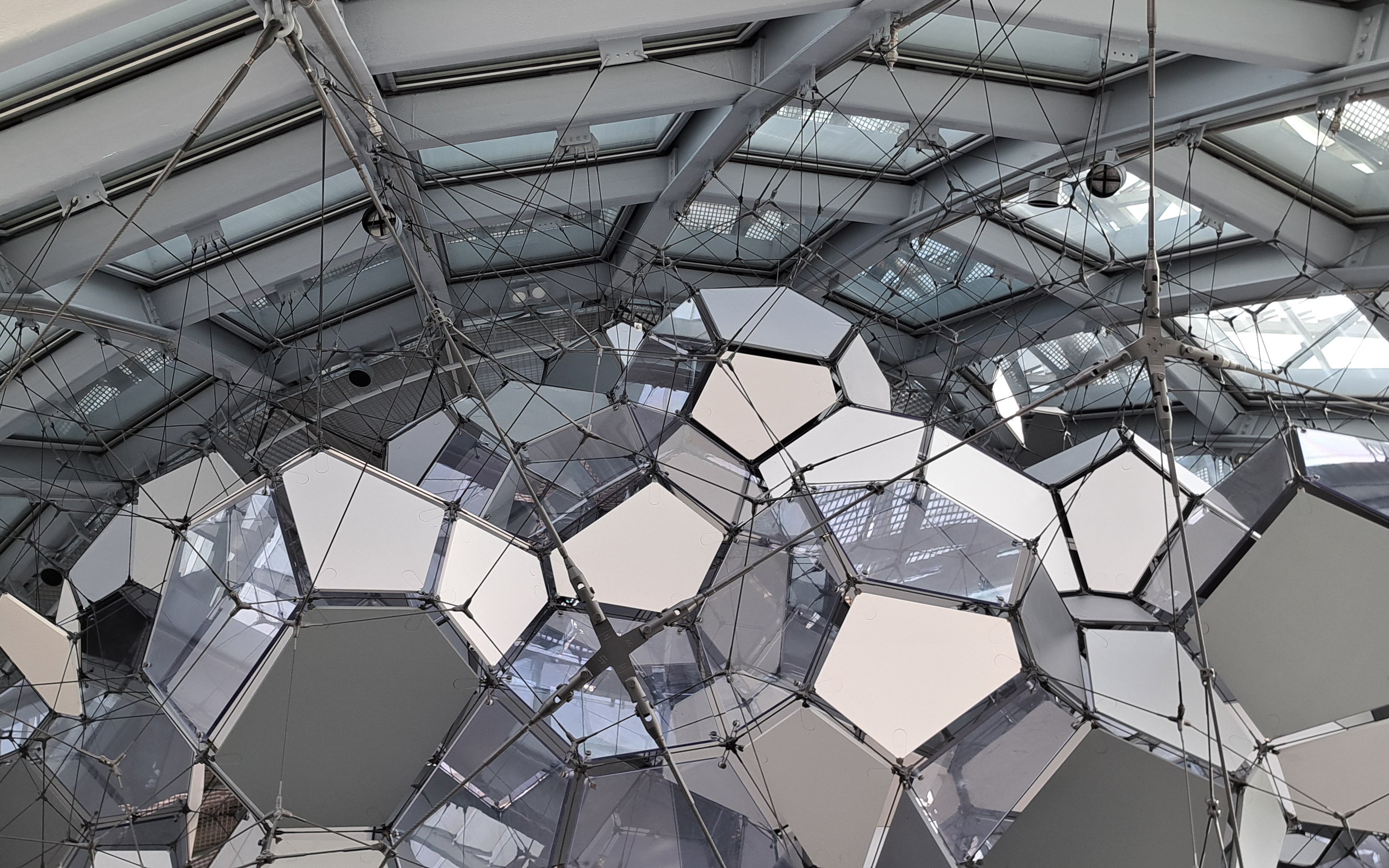 Geometric ceiling structure inside Glories Skyline Tower, Barcelona.
