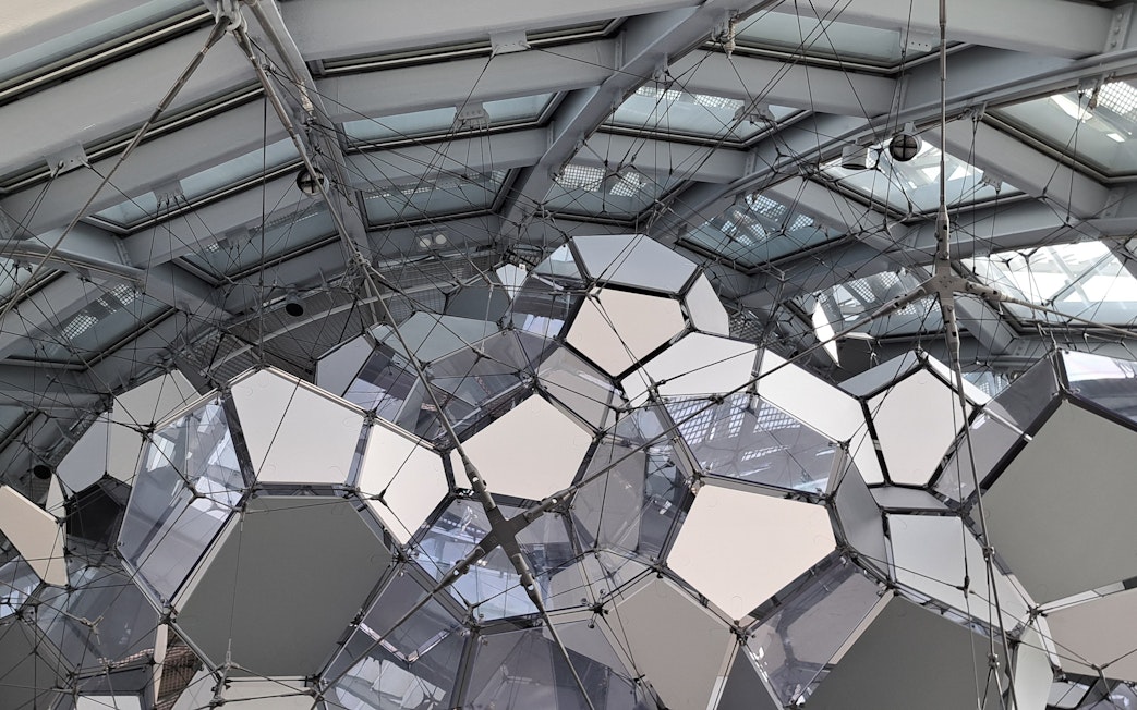 Geometric ceiling structure inside Glories Skyline Tower, Barcelona.