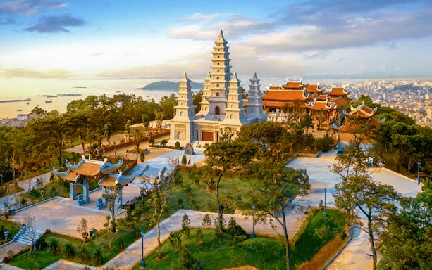 Sun World Halong complex with pagoda and scenic bay view in Vietnam.