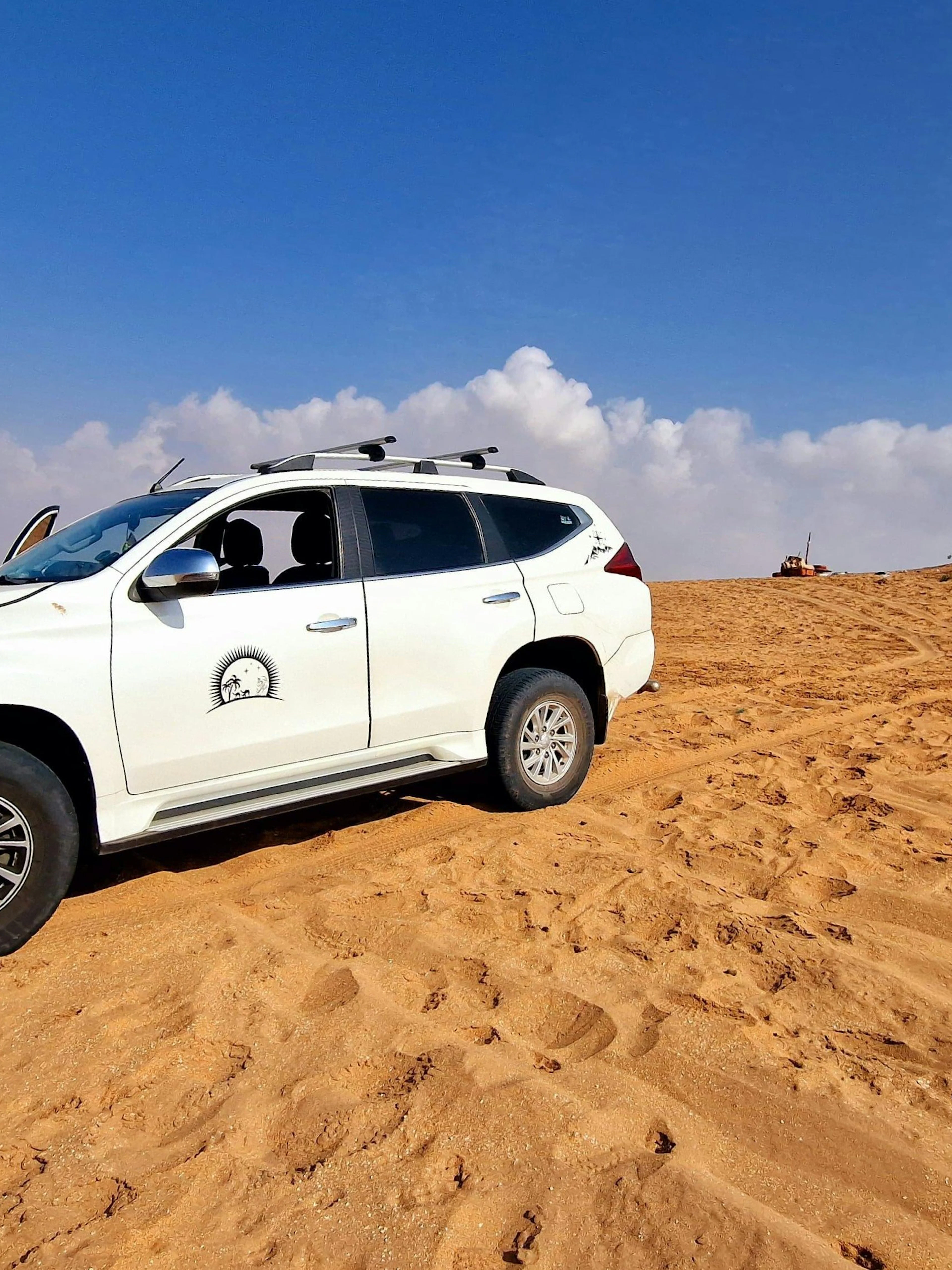 4x4 vehicle on Sahara Desert sand dunes, Agadir adventure tour.
