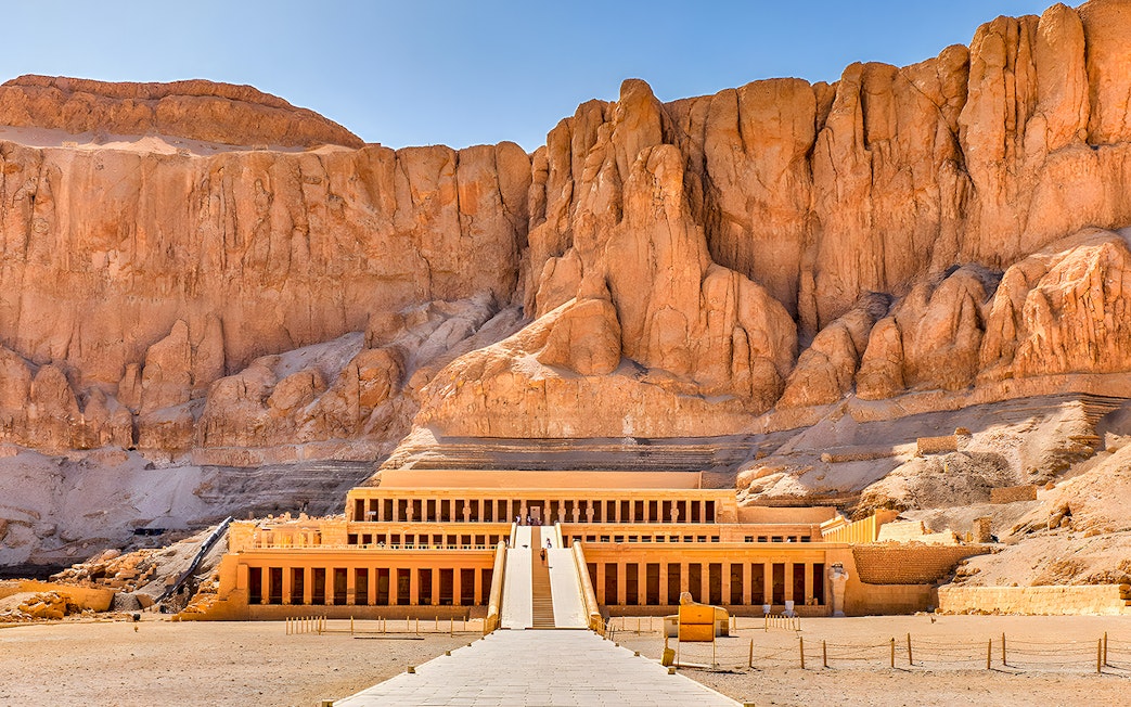 Mortuary Temple of Hatshepsut in Luxor, Egypt, with ancient columns and terraces.