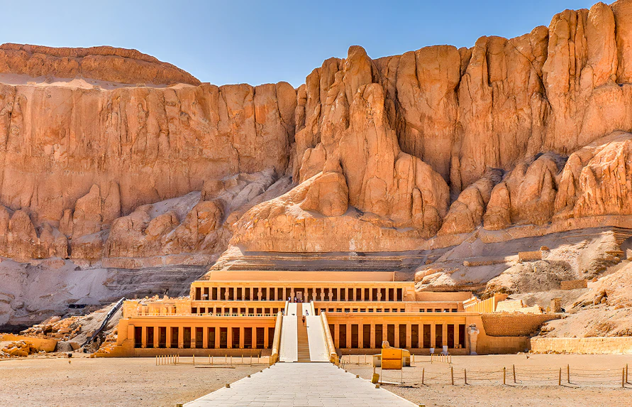 Mortuary Temple of Hatshepsut in Luxor, Egypt, with ancient columns and terraces.