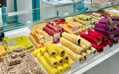 Assorted Turkish delight rolls displayed in a shop in Istanbul.