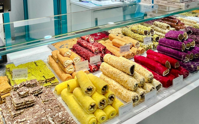 Assorted Turkish delight rolls displayed in a shop in Istanbul.