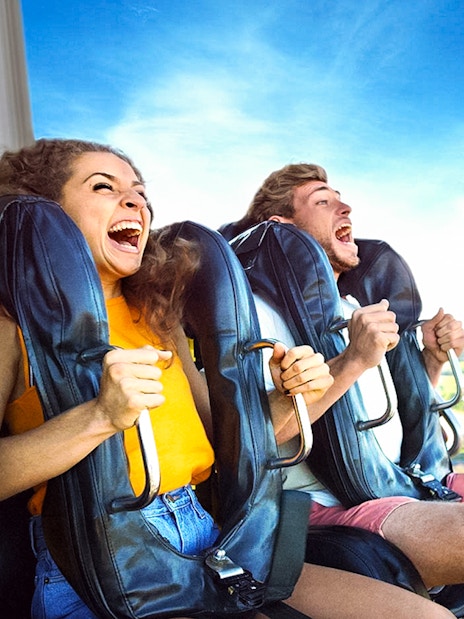 People enjoying a thrilling ride at Dreamworld amusement park.