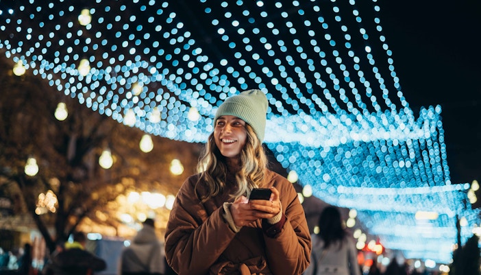 Niagara Falls illuminated with colorful lights during the Winter Festival of Lights.