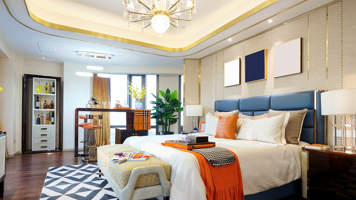 Luxury hotel room with elegant decor, plush bed, and modern furnishings.