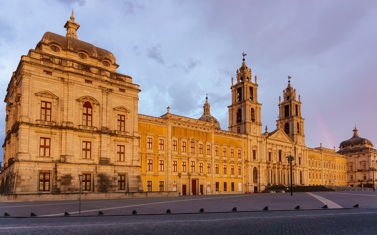 National Palace of Mafra facade at sunset, Portugal.