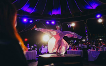Performer on stage at The Mirage dinner show, Burlesque, Vienna.