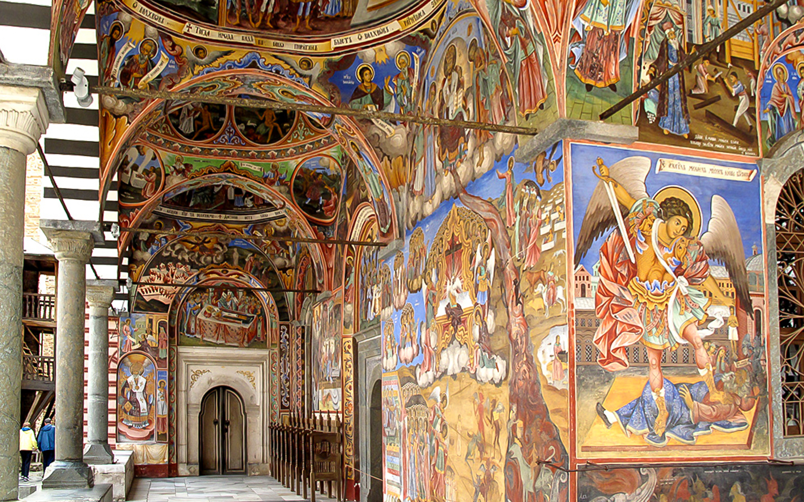 Frescoes depicting religious scenes inside the Rila Monastery, Bulgaria.