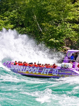 Guests enjoying Whirlpool Jet Boat Tour in Niagara Gorge, Canada.