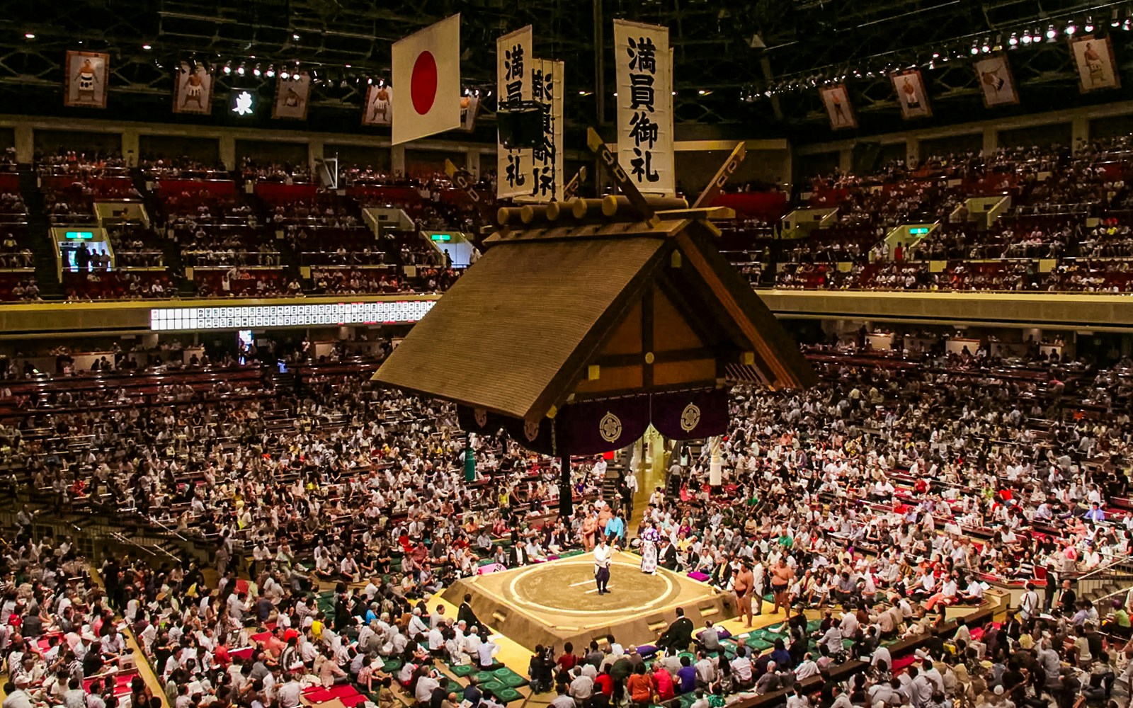 Tokyo sumo arena filled with spectators during the 2024 September Grand Sumo Tournament.