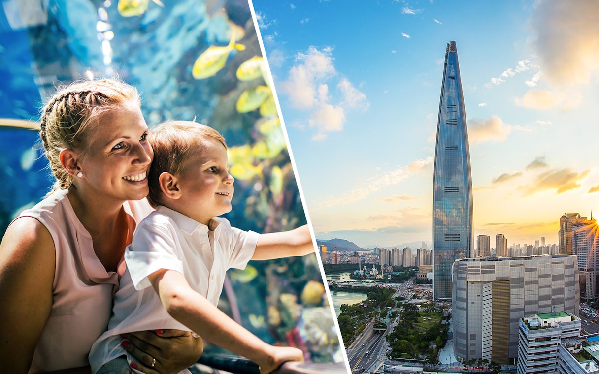 Mother and child at aquarium, view of Lotte World Tower in Seoul.