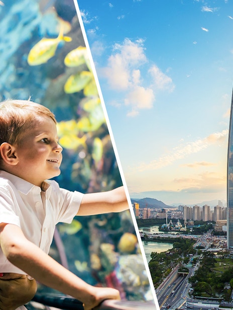 Mother and child at aquarium, view of Lotte World Tower in Seoul.