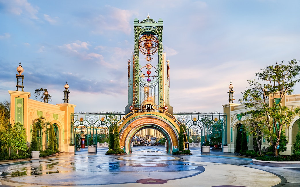 Epic Universe park entrance with ornate archway in Universal Orlando, Florida.