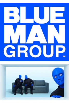 Blue Man Group performing on stage with vibrant lights in New York City.