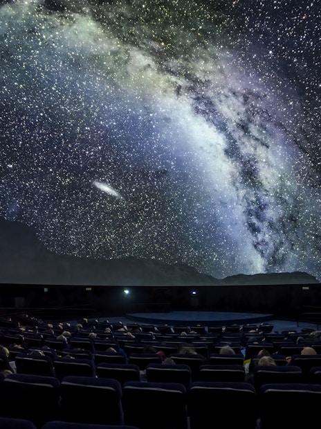 Planetarium show at Cité des Sciences et de l'Industrie, Paris, with starry sky projection.