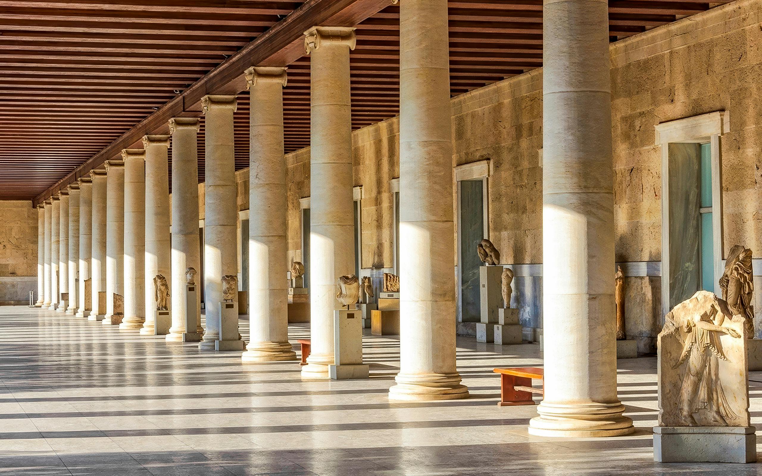 National Archaeological Museum Athens interior with ancient sculptures and columns.