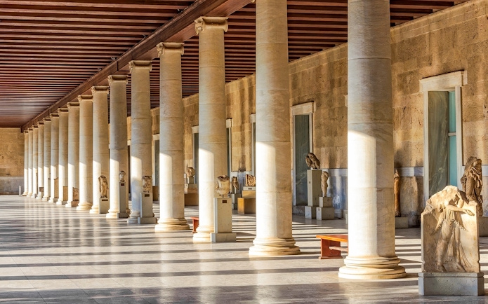National Archaeological Museum Athens interior with ancient sculptures and columns.