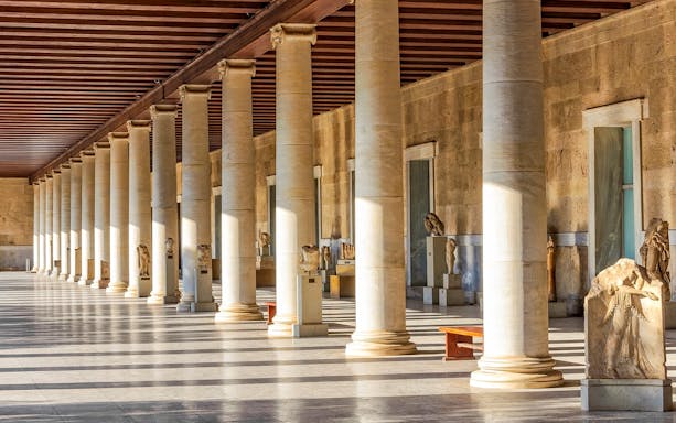 National Archaeological Museum Athens interior with ancient sculptures and columns.