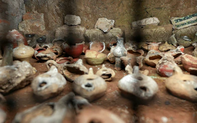 Ancient pottery and artifacts in the Capuchin Crypt, Rome.